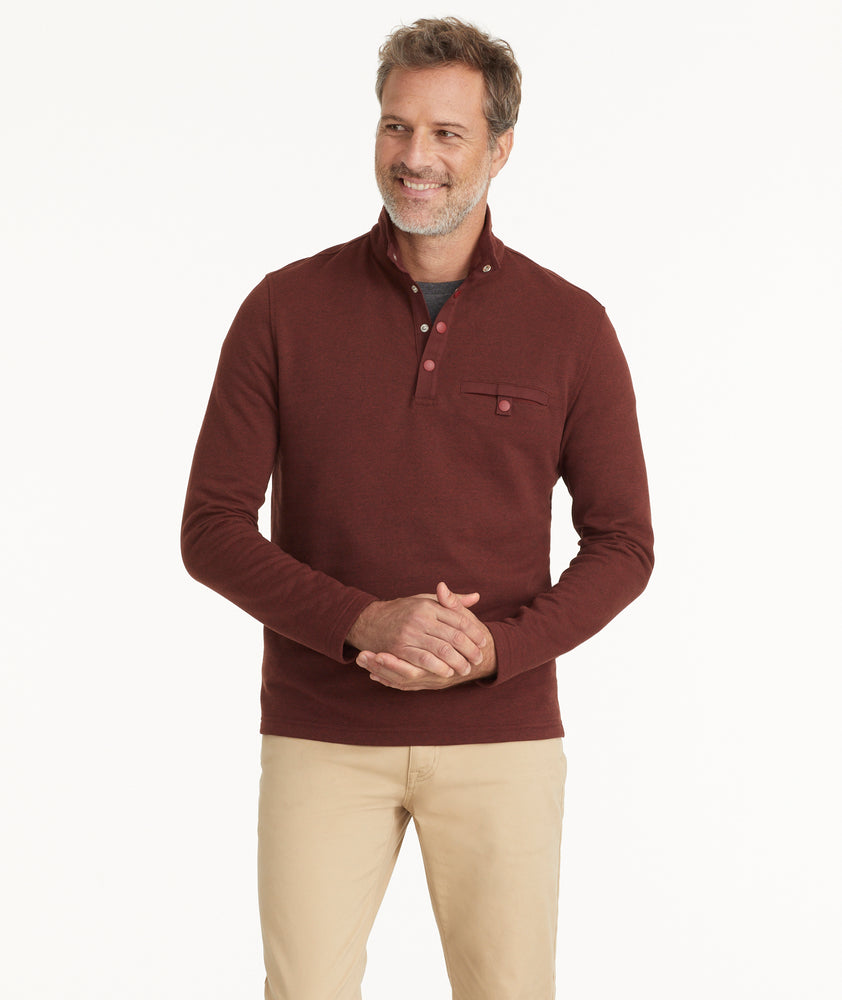 Model is wearing UNTUCKit Snap Fleece Pullover in Brick Red.