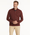 Model is wearing UNTUCKit Snap Fleece Pullover in Brick Red.