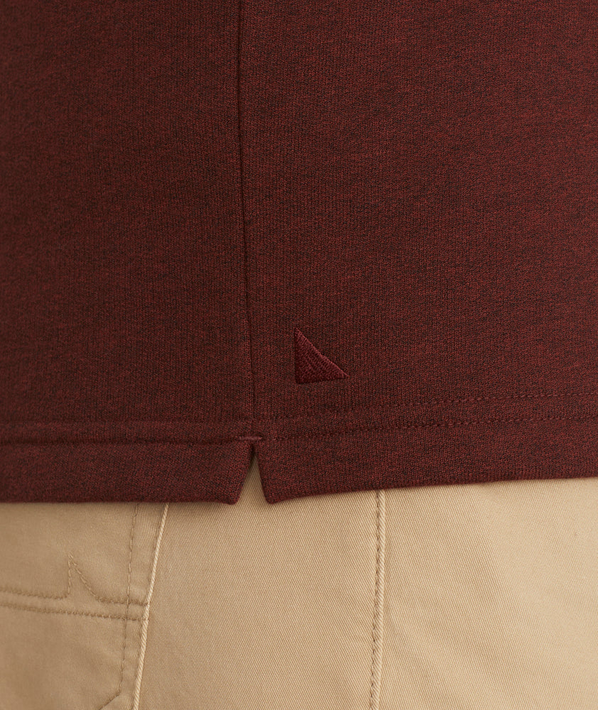 Model is wearing UNTUCKit Snap Fleece Pullover in Brick Red.