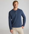 Model is wearing UNTUCKit Petrelson henley in Navy. 