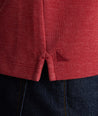 Model is wearing UNTUCKit Petrelson henley in Red. 
