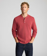 Model is wearing UNTUCKit Petrelson henley in Red. 