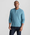Model is wearing UNTUCKit Petrelson henley in Teal. 