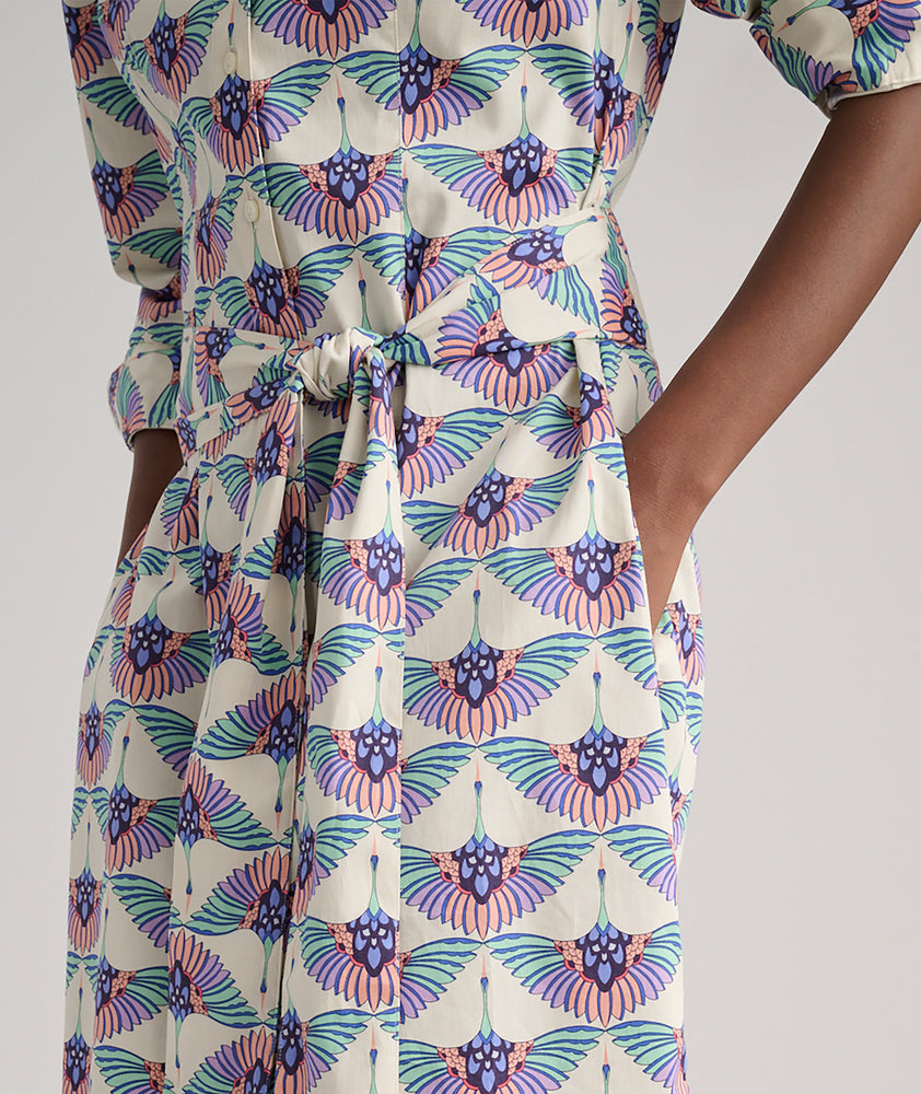 Model is wearing UNTUCKit Peyton dress.