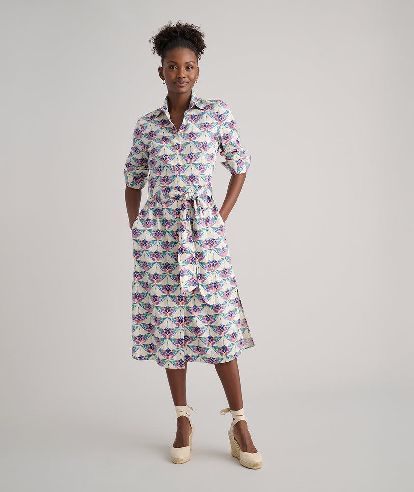 Model is wearing UNTUCKit Peyton dress.