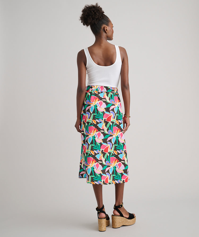 Model is wearing UNTUCKit pippa skirt in printed floral.