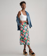 Model is wearing UNTUCKit pippa skirt in printed floral.