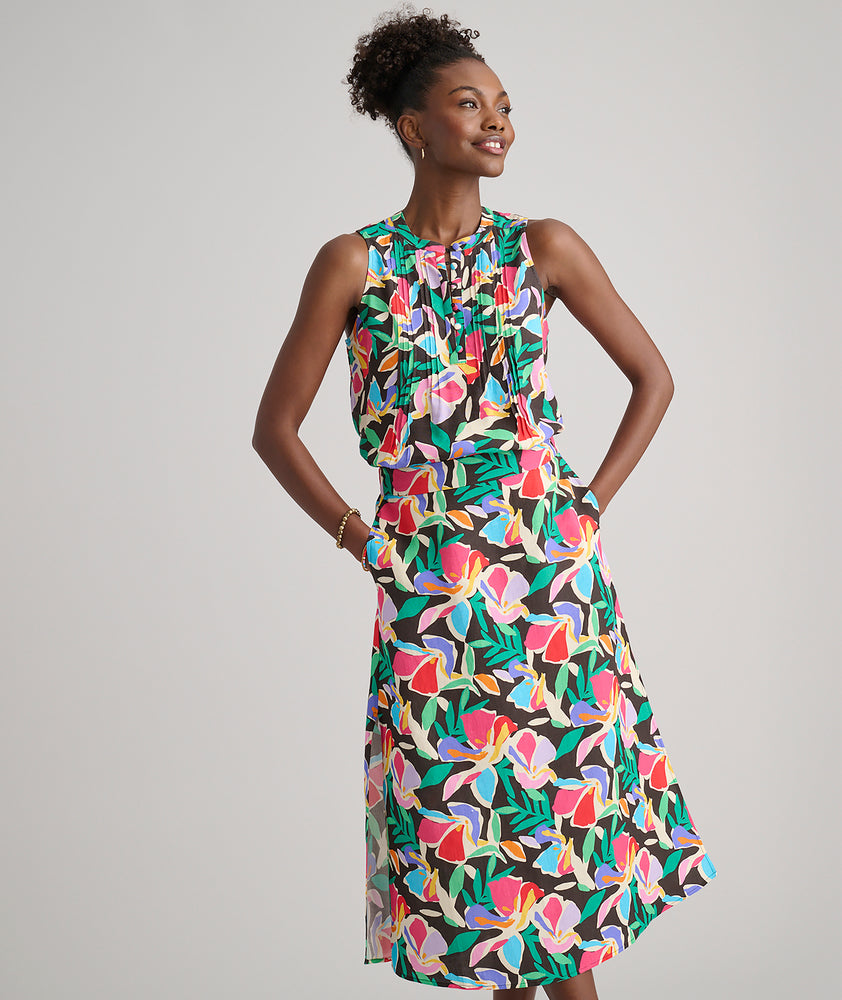 Model is wearing UNTUCKit pippa skirt in printed floral.