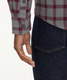 Model is wearing UNTUCKit Brushed Overshirt in Gray & Maroon Check.