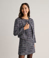 Model is wearing UNTUCKit Tweed Ravenna Shift Dress.