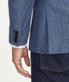 Model is wearing UNTUCKit Italian Wool Rawlins Sport Coat in Blue Herringbone.