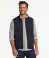 Model is wearing UNTUCKit Rebulo vest in black.