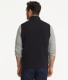 Model is wearing UNTUCKit Rebulo vest in black.