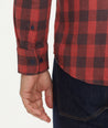 Model is wearing UNTUCKit red and burgundy buffalo check flannel.