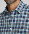 Model is wearing UNTUCKit Reiner performance shirt. 