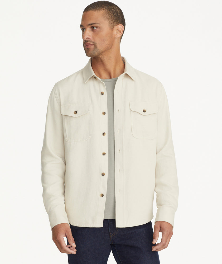 Model is wearing UNTUCKit Cotton-Linen Overshirt in Off-White.