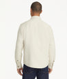 Model is wearing UNTUCKit Cotton-Linen Overshirt in Off-White.