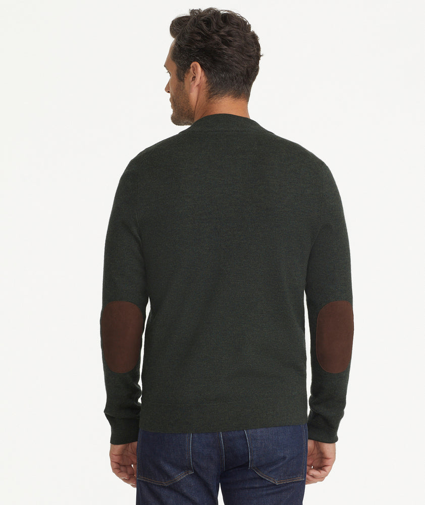 Model is wearing UNTUCKit Reynoso with Elbow Patch in Forest Night