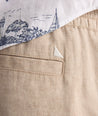 Model is wearing UNTUCKit Linen-Cotton Utility Shorts. 
