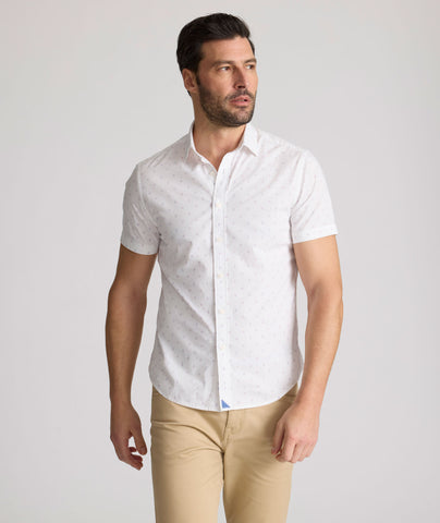 Model is wearing UNTUCKit Rockwell short sleeve cotton shirt. 