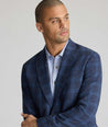 Model wearing a navy Sport Coat.