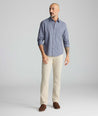 Model is wearing UNTUCKit 5-Pocket Stretch Terry Pants in London fog. 