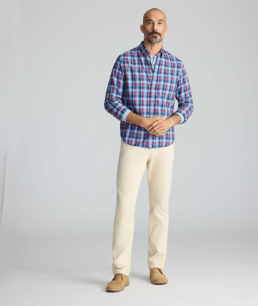 Model is wearing UNTUCKit 5-Pocket Stretch Terry Pants in stone. 