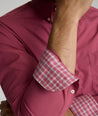 Model is wearing UNTUCKit Rosaire wrinkle-free shirt in Rhododenron.