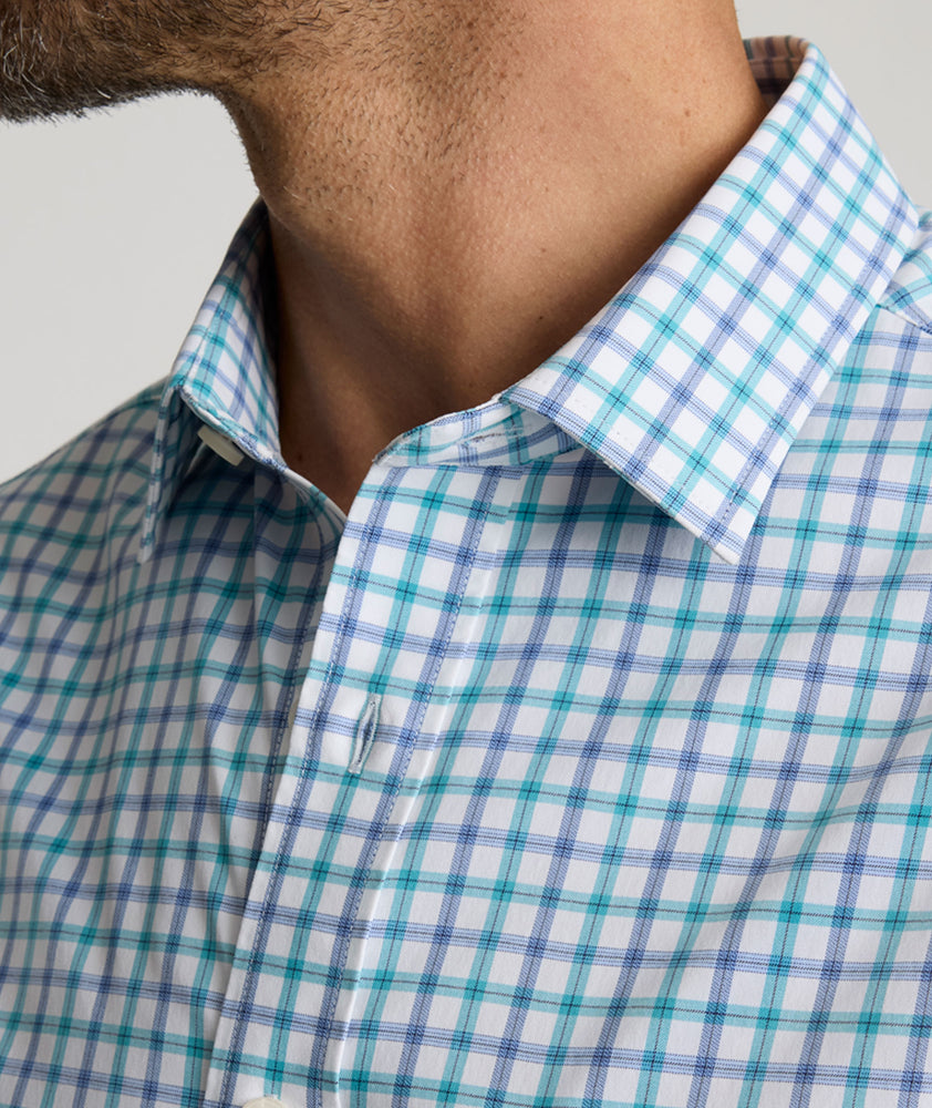 Model is wearing UNTUCKit Roscoe Performance shirt. 