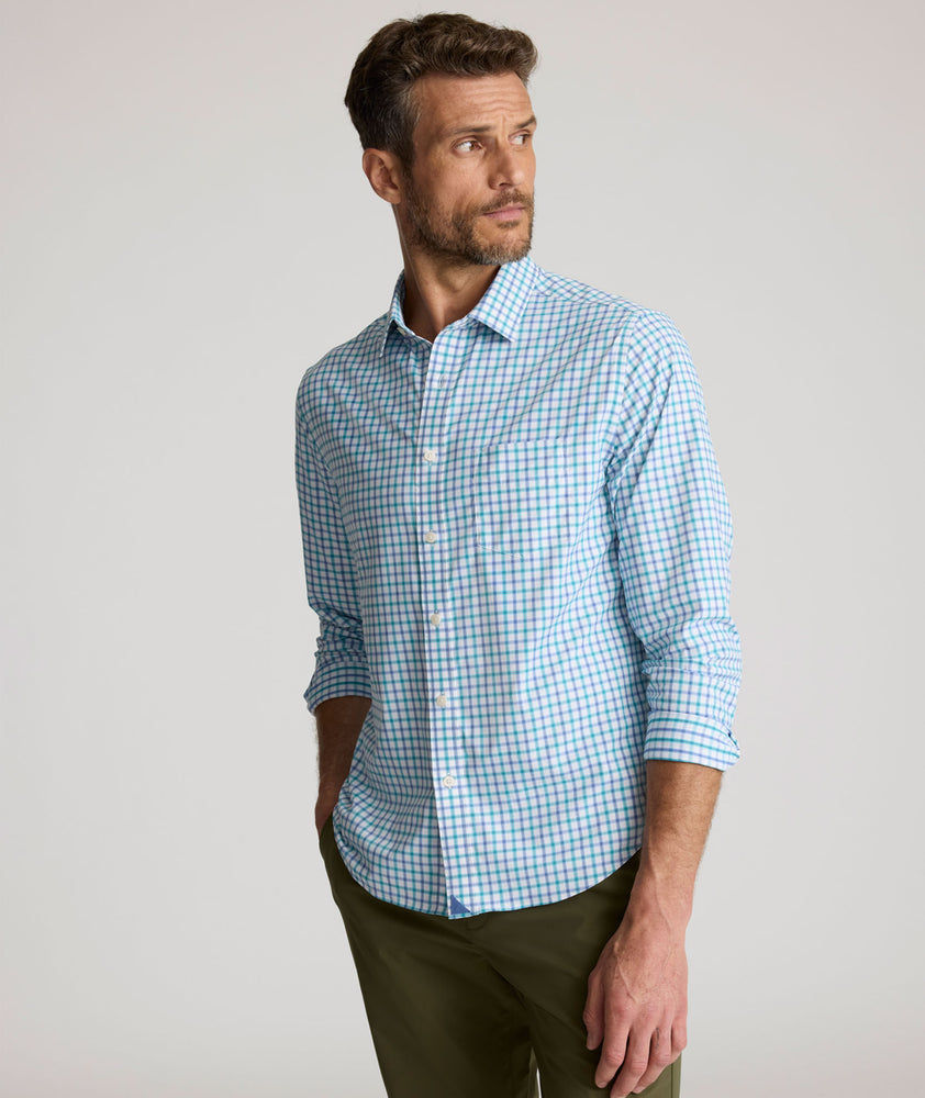 Model is wearing UNTUCKit Roscoe Performance shirt. 