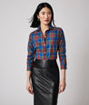 Model is wearing UNTUCKit Sadie shirt in blue plaid.