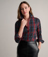 Model is wearing UNTUCKit Sadie plaid shirt. 