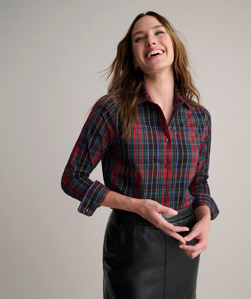 Model is wearing UNTUCKit Sadie plaid shirt. 