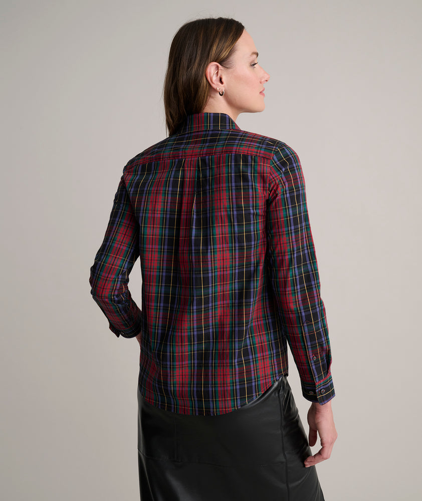 Model is wearing UNTUCKit Sadie plaid shirt. 
