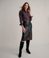 Model is wearing UNTUCKit Sadie plaid shirt. 
