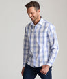 Model is wearing UNTUCKit Samson wrinkle free shirt. 