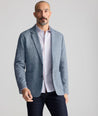 Model is wearing UNTUCKit Cotton-Blend Knit San Oro Sport Coat in Blue. 