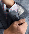 Model is wearing UNTUCKit Cotton-Blend Knit San Oro Sport Coat in Blue. 
