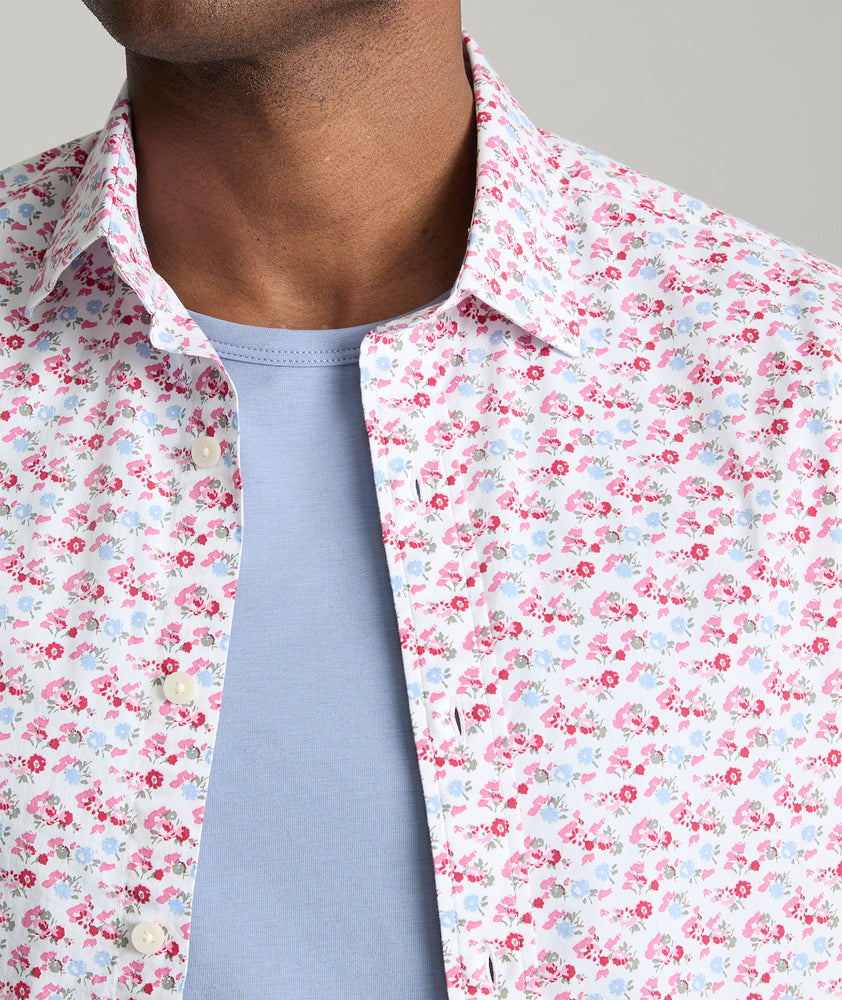 Model is wearing UNTUCKit Sanchez short sleeve shirt in pink.