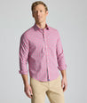 Model is wearing UNTUCKit Wrinkle-Free Santos Shirt in pink. 