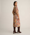 Model is wearing UNTUCKit Quilted Cotton Blend Puff Sleeve Mindy Shirt. 