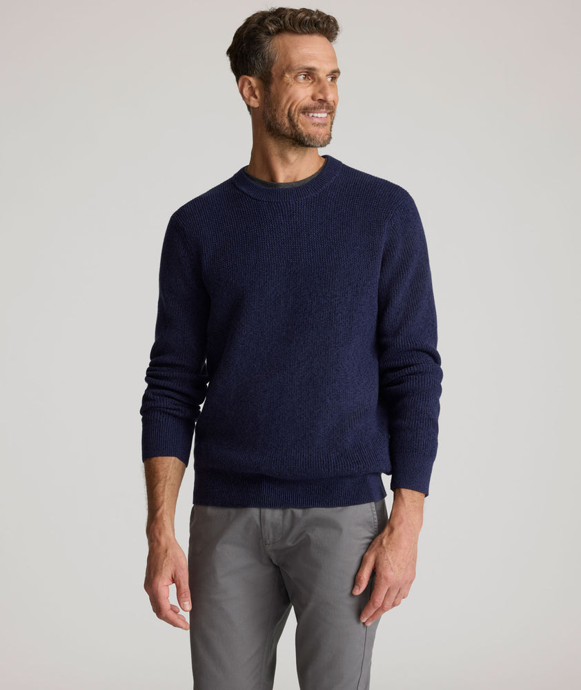 Model is wearing UNTUCKit Seaver Crewneck in Evening Blue.