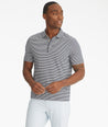 Model is wearing UNTUCKit Segura stripe polo.