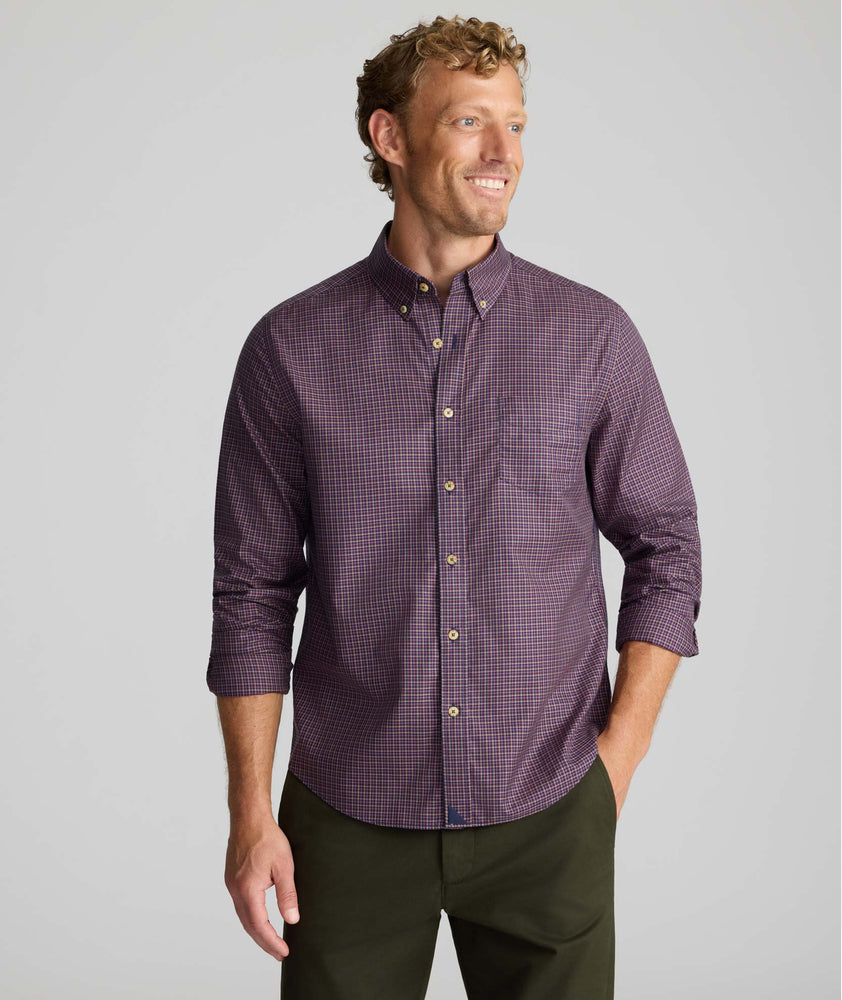 Model is wearing UNTUCKit Wrinkle-Free Serfield Shirt in Multicolor Check.