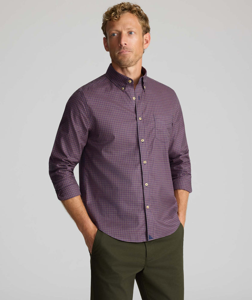 Model is wearing UNTUCKit Wrinkle-Free Serfield Shirt in Multicolor Check.
