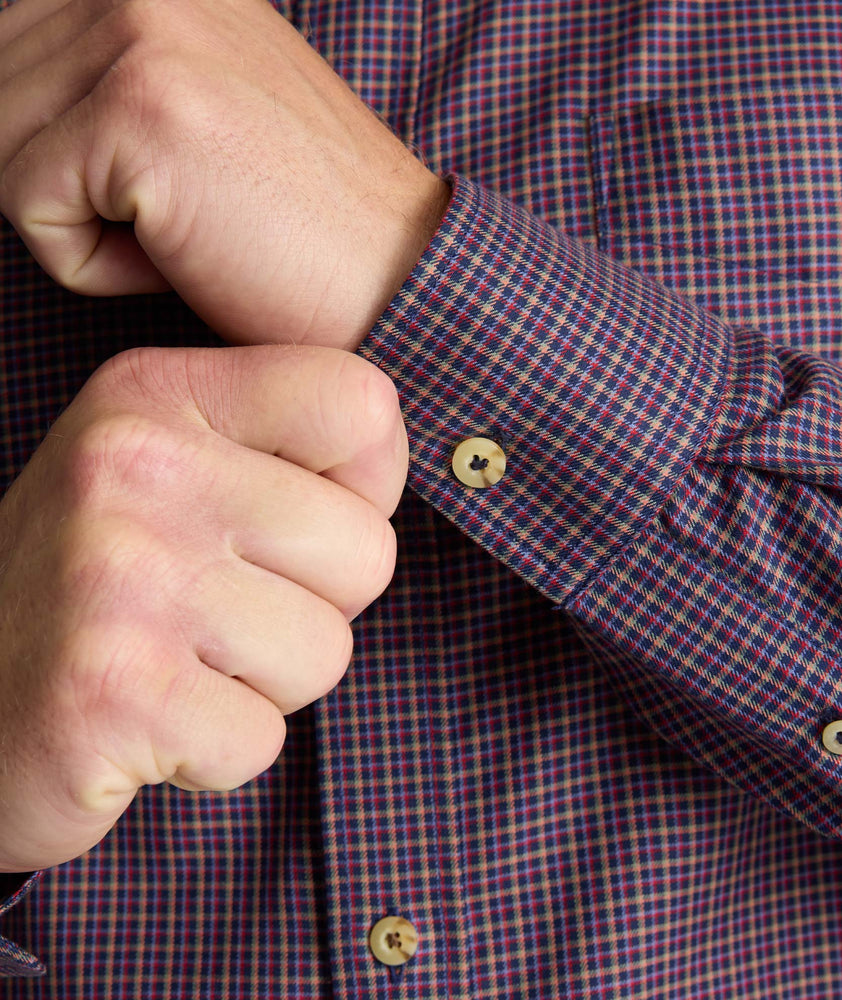 Model is wearing UNTUCKit Wrinkle-Free Serfield Shirt in Multicolor Check.