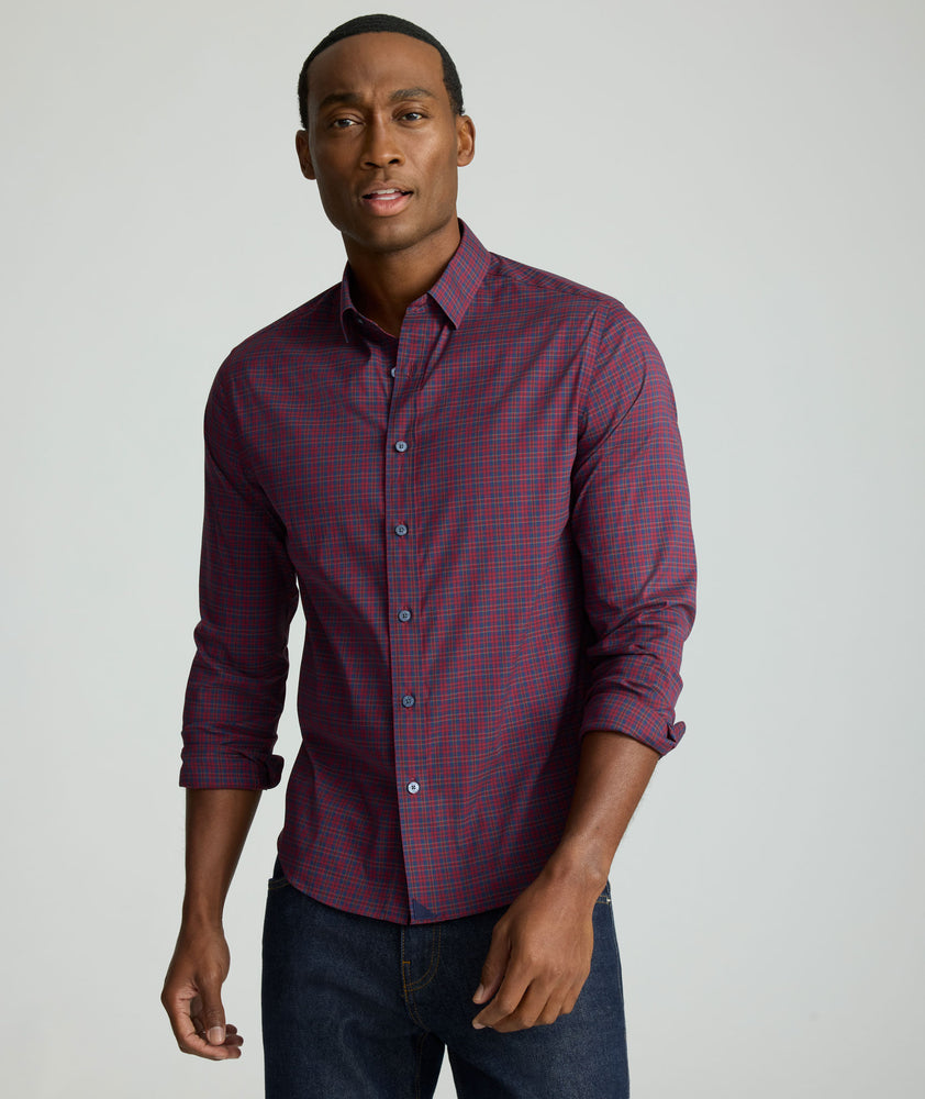 Model is wearing UNTUCKit CottonTek™ Severen Shirt	in Red & Blue Plaid.