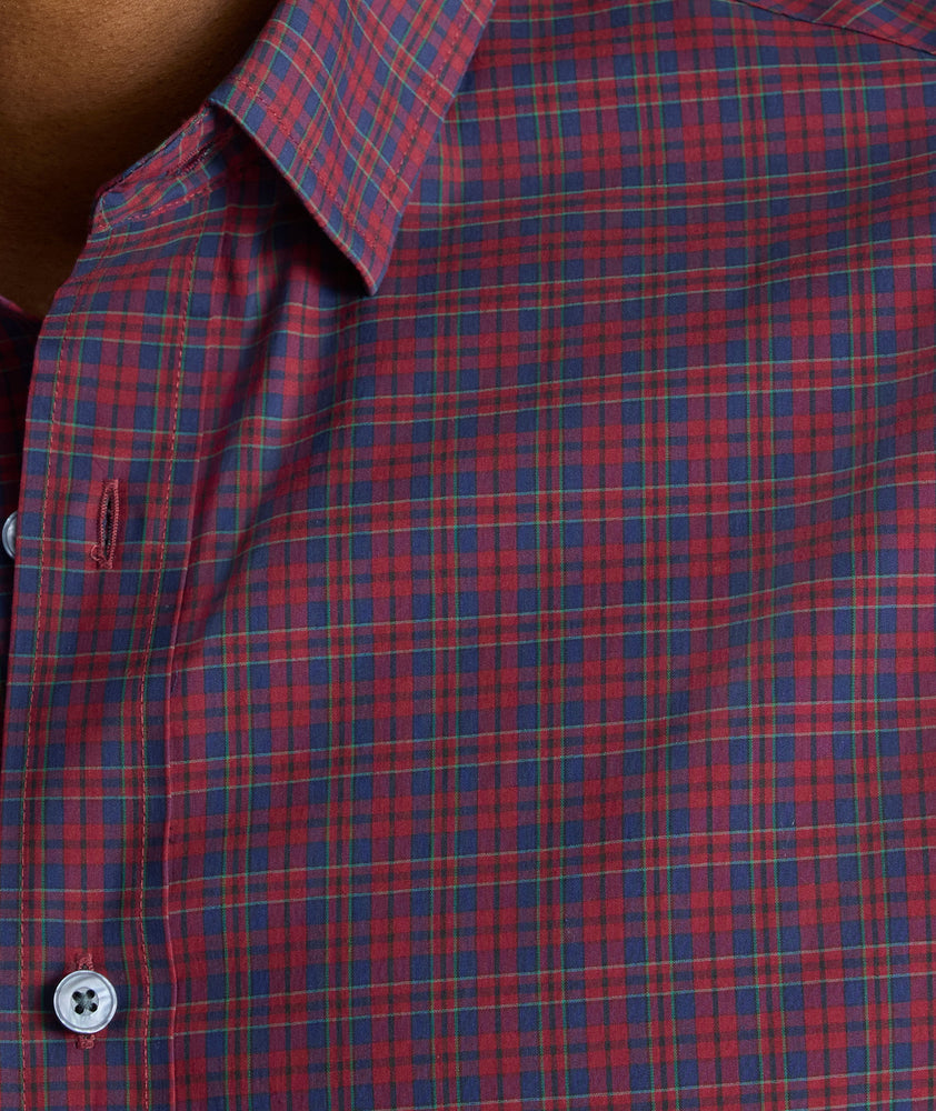 Model is wearing UNTUCKit CottonTek™ Severen Shirt	in Red & Blue Plaid.