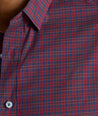 Model is wearing UNTUCKit CottonTek™ Severen Shirt	in Red & Blue Plaid.