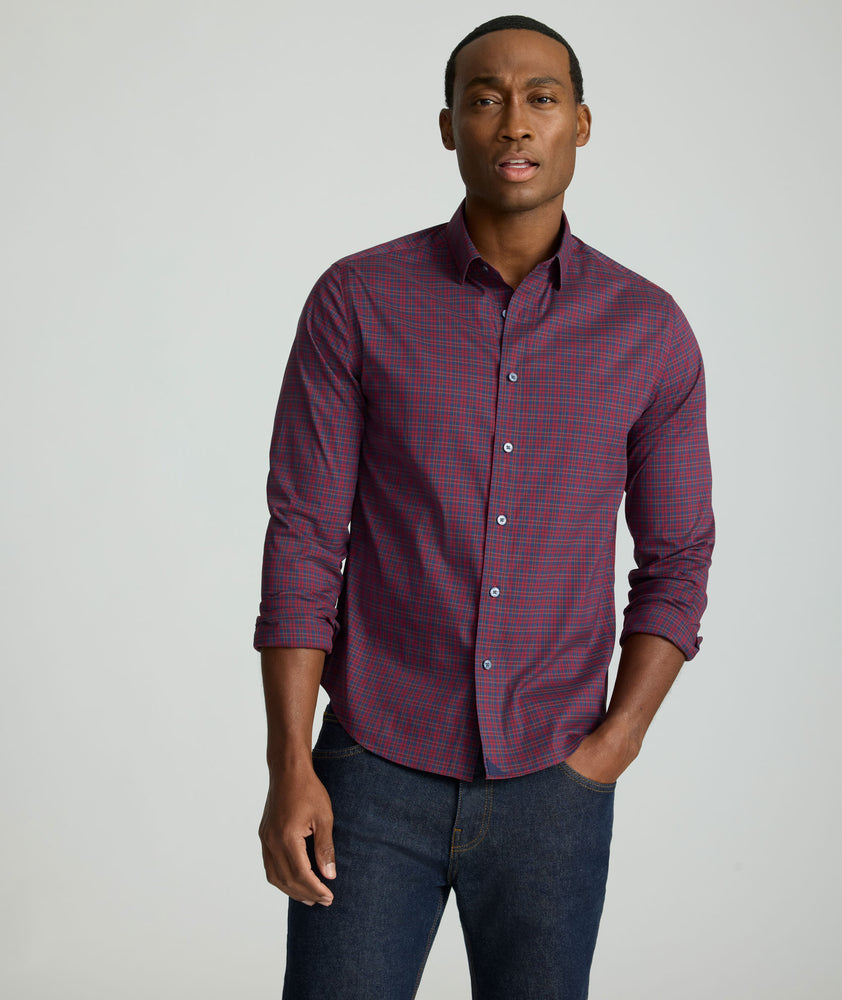 Model is wearing UNTUCKit CottonTek™ Severen Shirt	in Red & Blue Plaid.